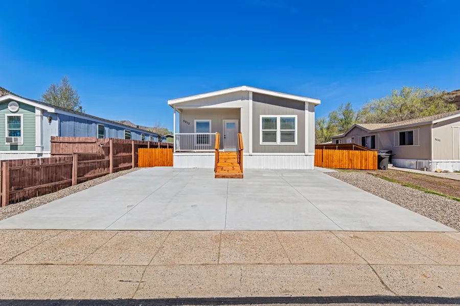 Close front view of the home at 5010 E Dean Ave